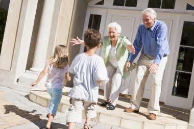 Grandparents welcoming grandchildren clipart