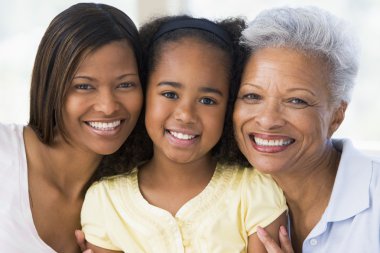 Grandmother with adult daughter and grandchild clipart