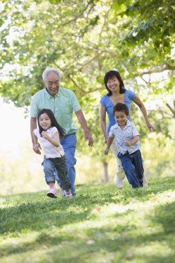 Grandparents running with grandchildren clipart