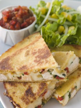 Quesadillas with Cajun Chicken Cheese Tomato Salsa and corn Sala clipart