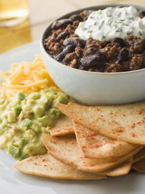 Bowl of Chilli with Tortilla Chips clipart