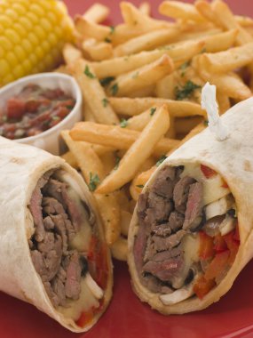 Philly Beef Steak Wrap with Fries Tomato Salsa and Corn clipart