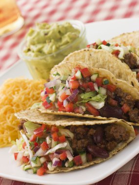 Beef Tacos with Cheese Salad and Guacamole clipart