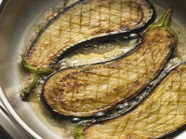 Eggplant Frying in Corn Oil clipart