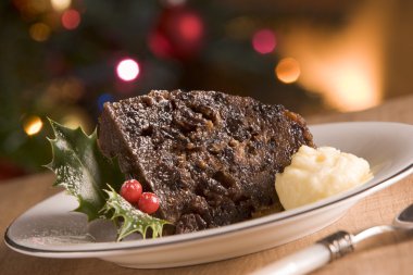 Portion of Christmas Pudding with Brandy Butter clipart