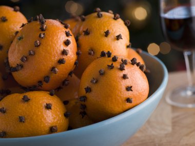 Bowl of Clove Studded Satsumas clipart