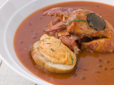 Bowl of Lobster Bisque Rouille Croute and Sliced Truffle clipart