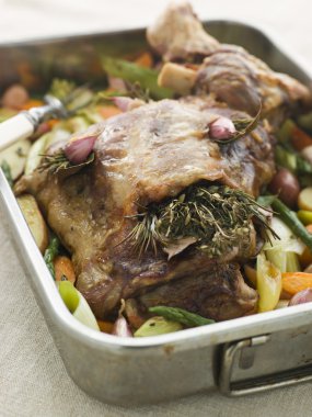 Slow Roasted Shoulder of Lamb Stuffed with Herbs de Provence Roa clipart