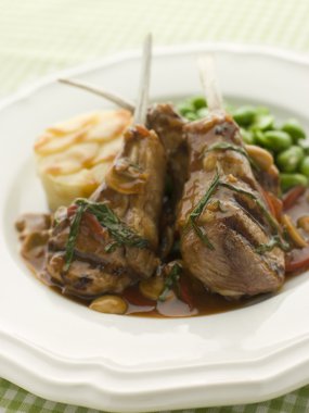 Grilled Lamb Cutlets Chasseur sauce Pomme Anna and Baby Broad be clipart