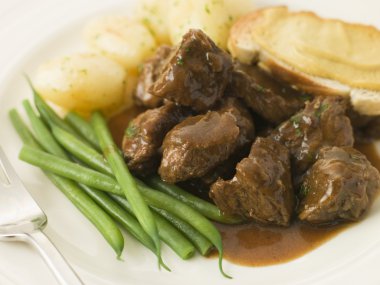 Beef Carbonnade with a Mustard Crouton and Green Beans clipart