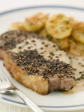 Steak au Poirve' with Saut Potatoes clipart