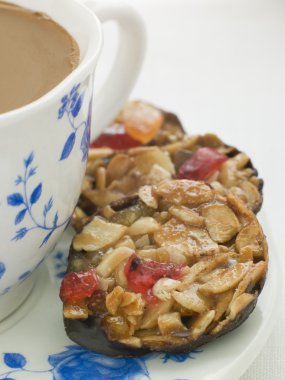 Petit Florentines with a Cup of Tea clipart