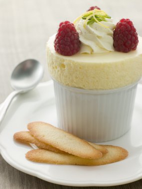 Chilled Lemon Souffle with Langue de Chat Biscuits clipart