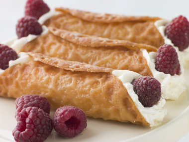 Cream Brandy Snaps with Raspberries clipart