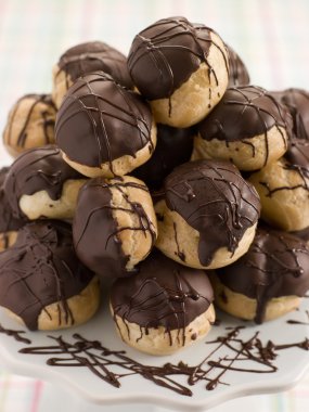 Chocolate Profiteroles on a Cake Stand clipart