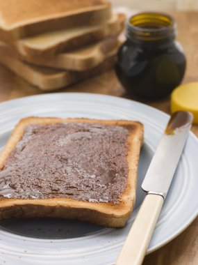 Slices of Toast with Yeast Extract Spread clipart