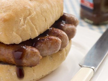 Pork Sausage Crusty Roll with Brown Sauce clipart