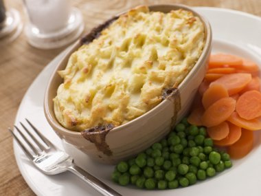 Individual Cottage Pie with Peas and Carrots clipart