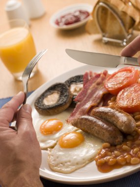 Eating a Full English Breakfast clipart