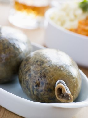 Whole Haggis with Neeps Tatties and Whiskey clipart