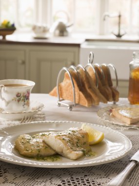 Smoked Haddock with Herb Butter and Toast clipart