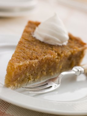 Slice of Treacle Tart with Whipped Cream clipart