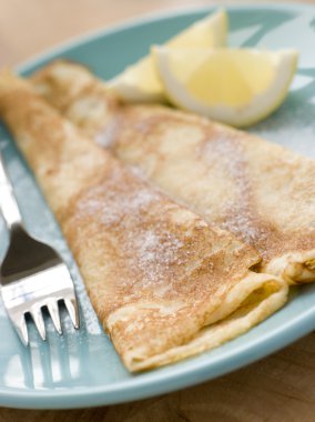 Folded Pancakes with Lemon and Sugar clipart