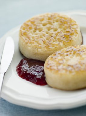 Crumpets with Butter and Jam clipart