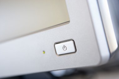 Shot of a power button on a computer monitor clipart