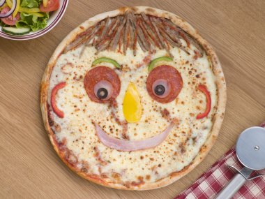 Smiley Faced Pizza with a Side Salad clipart