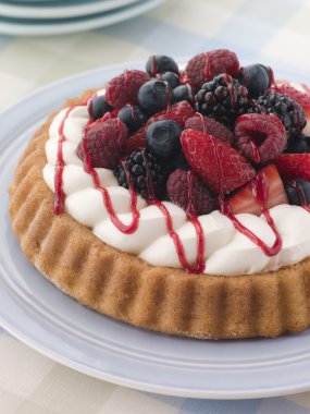 Whipped Cream and Berry Sponge Flan clipart