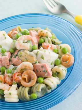 Seafood Pasta Spirals with Peas and Herbs clipart