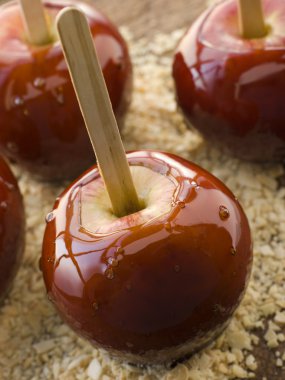 Toffee Apples on Crushed Toasted Almonds clipart