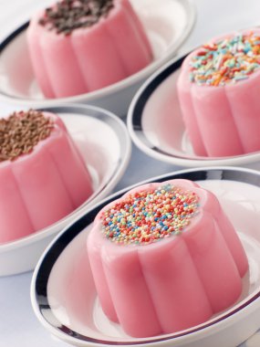 Blancmange with different toppings clipart