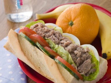 Tuna Egg and Salad Baguette with Fresh Fruit clipart