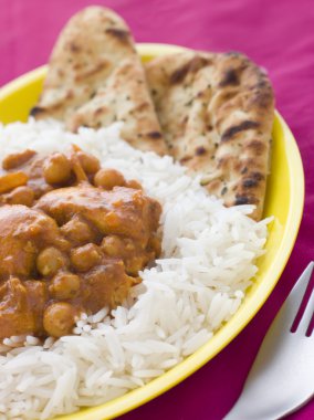 Chicken and Chickpea Curry with Rice and Naan Bread clipart