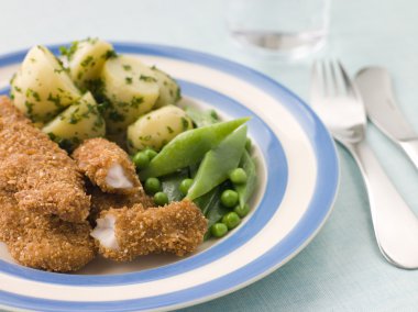 Chicken Goujons with Herb Buttered New Potatoes and Green Vegeta clipart
