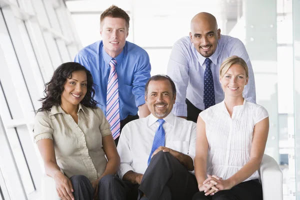 Group of businesspeople in lobby — Stock Photo, Image
