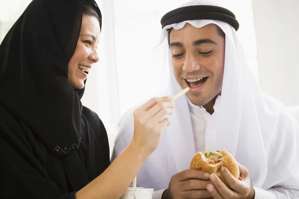 Middle Eastern Couple Sharing Fast Food Meal — Stock Photo, Image
