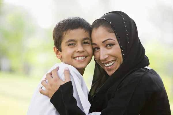 Middle Eastern Woman Her Son Sitting Park — Stock Photo, Image