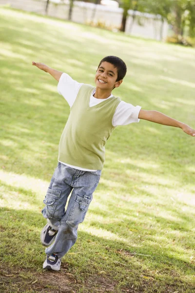 Boy having fun in park — Stock Photo, Image
