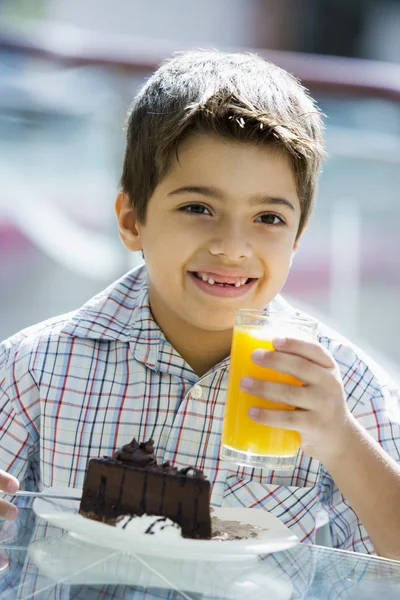 Boy Drinking Glass Orange Juice Cafe — Stock Photo, Image