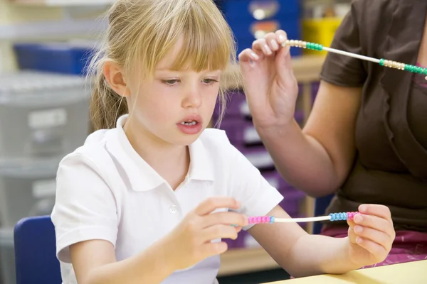 stock image A schoolgirl in a primary class