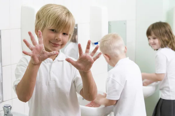 Boy Displaying His Hands Primary School Bathroom — Stock Photo, Image