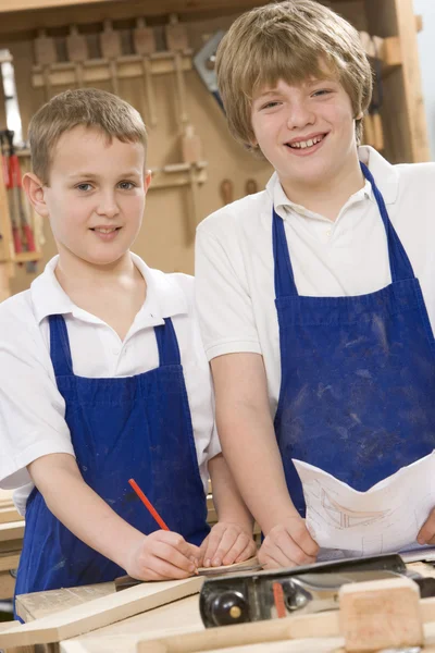 Schoolboys in woodwork class — Stock Photo, Image