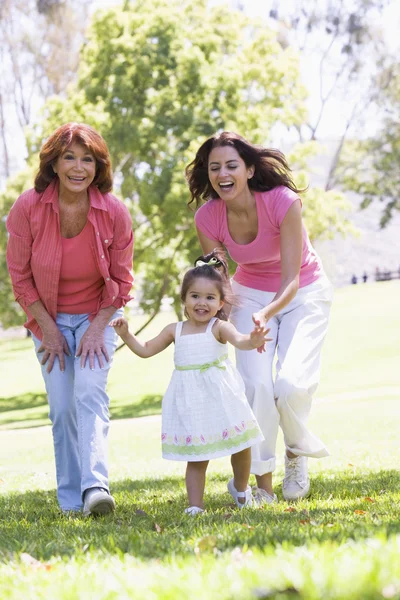 Grandmother with adult daughter and granddaughter in park — Stock Photo, Image