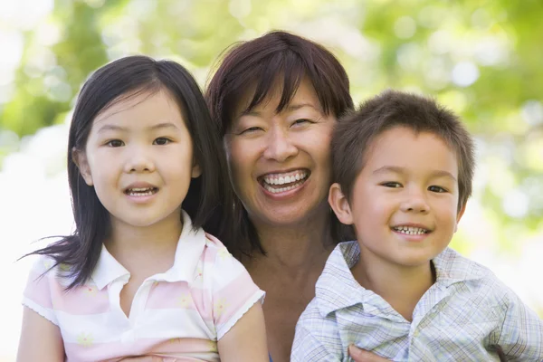 Grandmother laughing with grandchildren — Stock Photo, Image