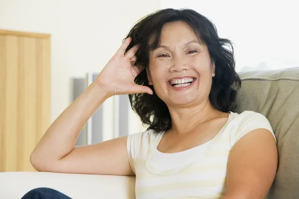 Woman Sitting Living Room Laughing — Stock Photo, Image