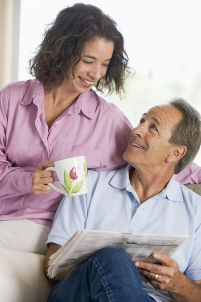 Couple Relaxing Newspaper Smiling — Stock Photo, Image