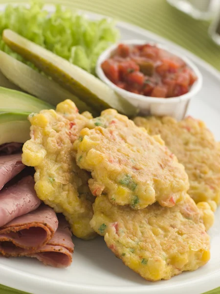 Sweet corn Fritters with Salsa Gherkins Avocado and Pastrami — Stock Photo, Image